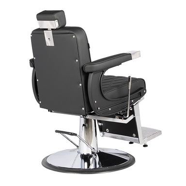 Black barber chair with chrome base on a white background
