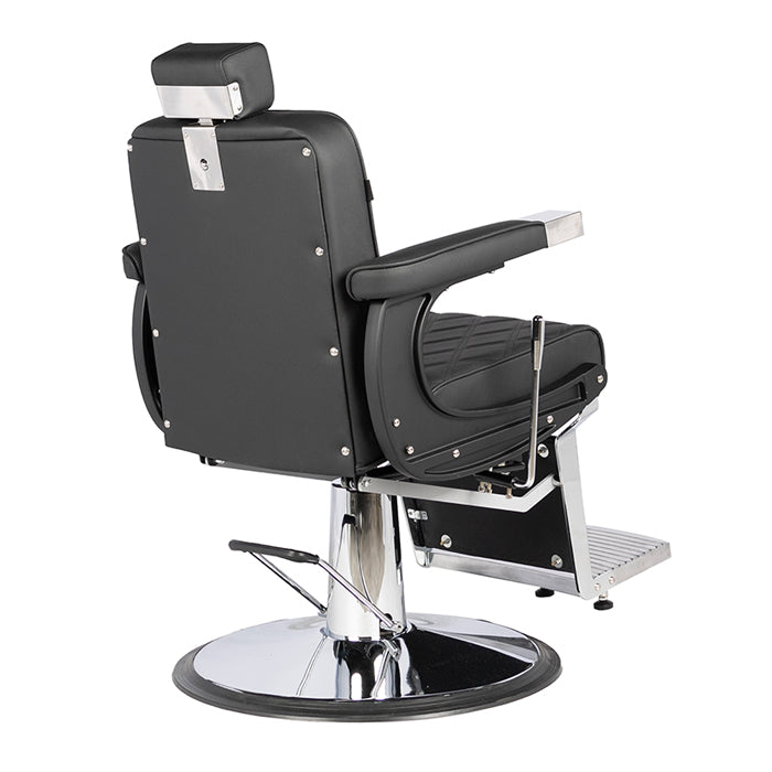 Black barber chair with chrome base on a white background
