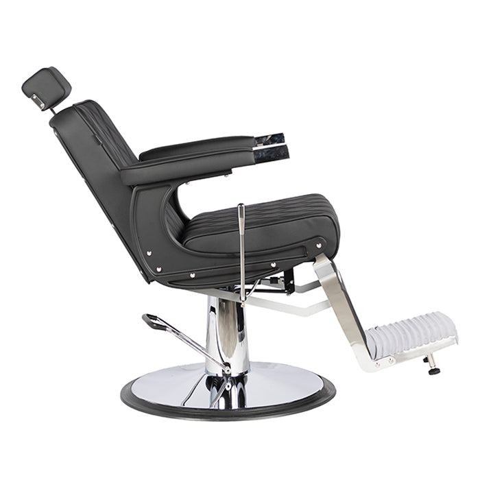 Black barber chair with chrome base on a white background