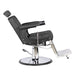 Black barber chair with chrome base on a white background