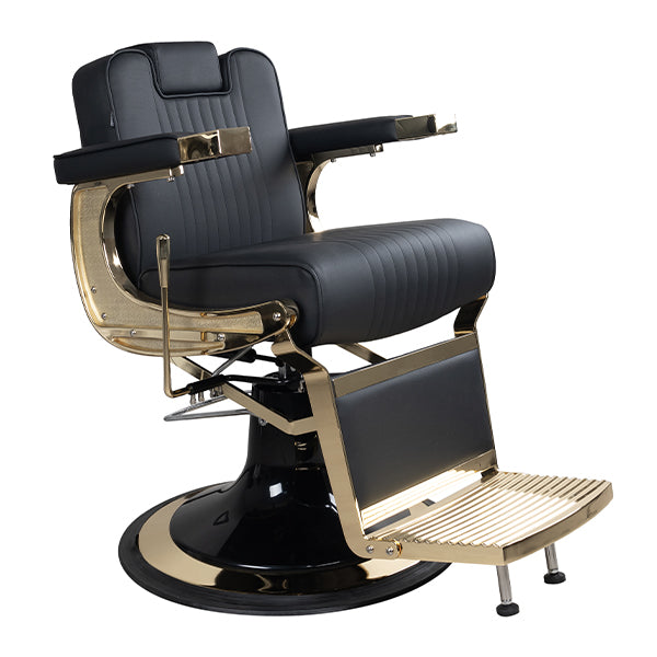 Barber chair with black leather seat and gold accents on a white background