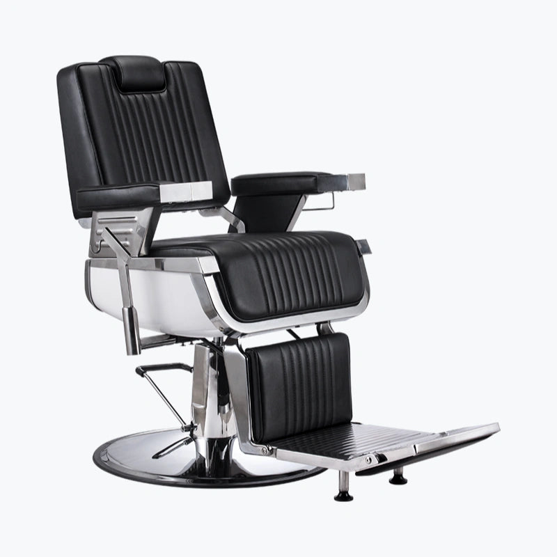 Black and silver barber chair on a white background