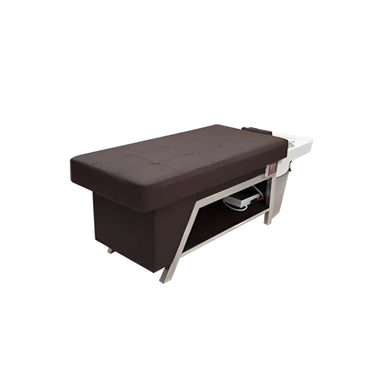 Massage table with brown cover on a white background