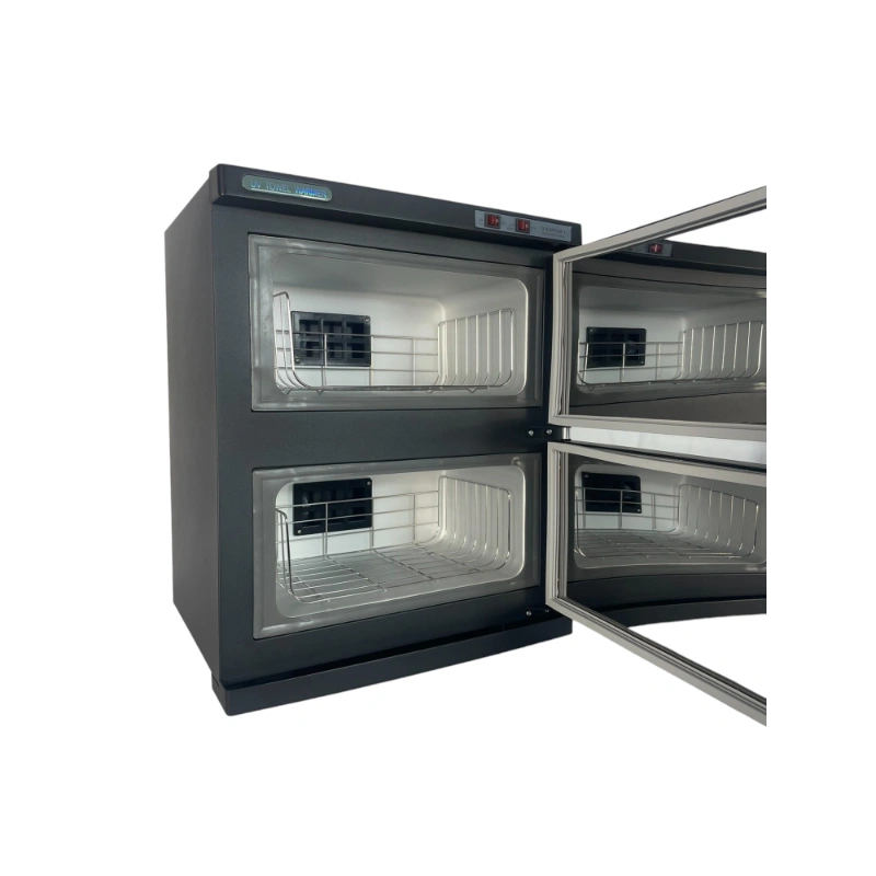 Double oven with open doors on a white background