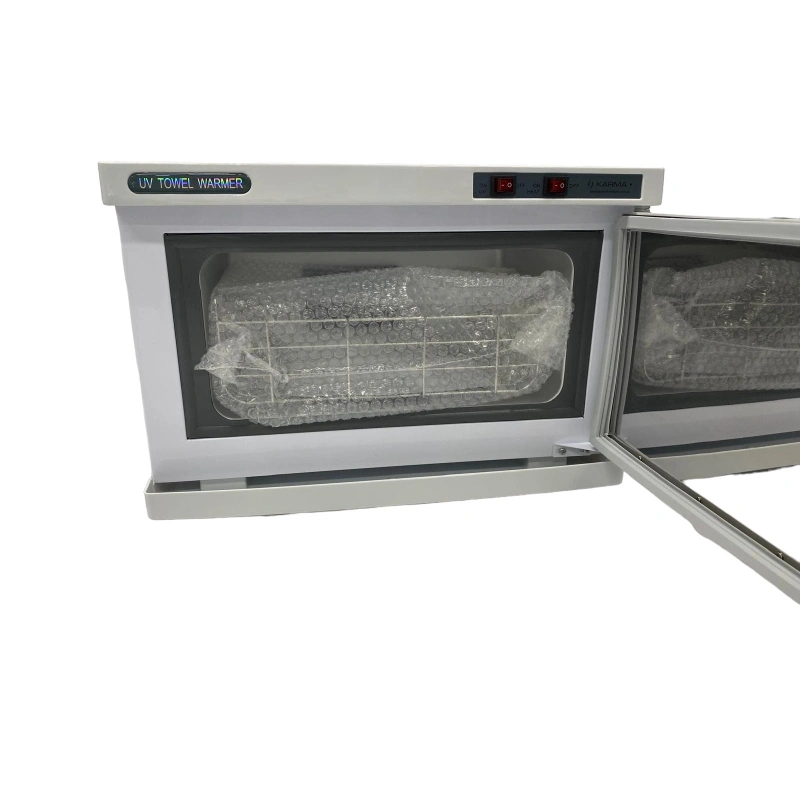 UV towel warmer with towels inside on a white background