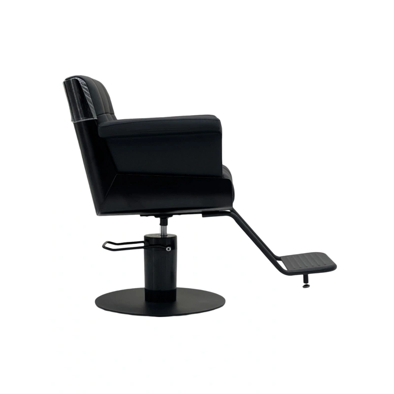 Black barber chair on a white background
