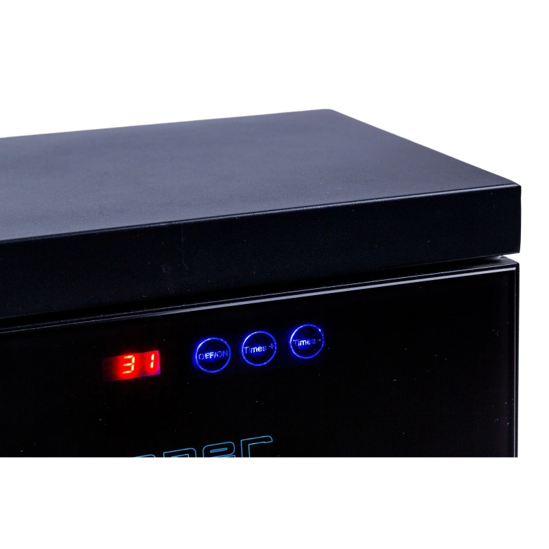 Black electronic device with digital display on a white background